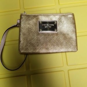 Gold Michael Kors wristlet